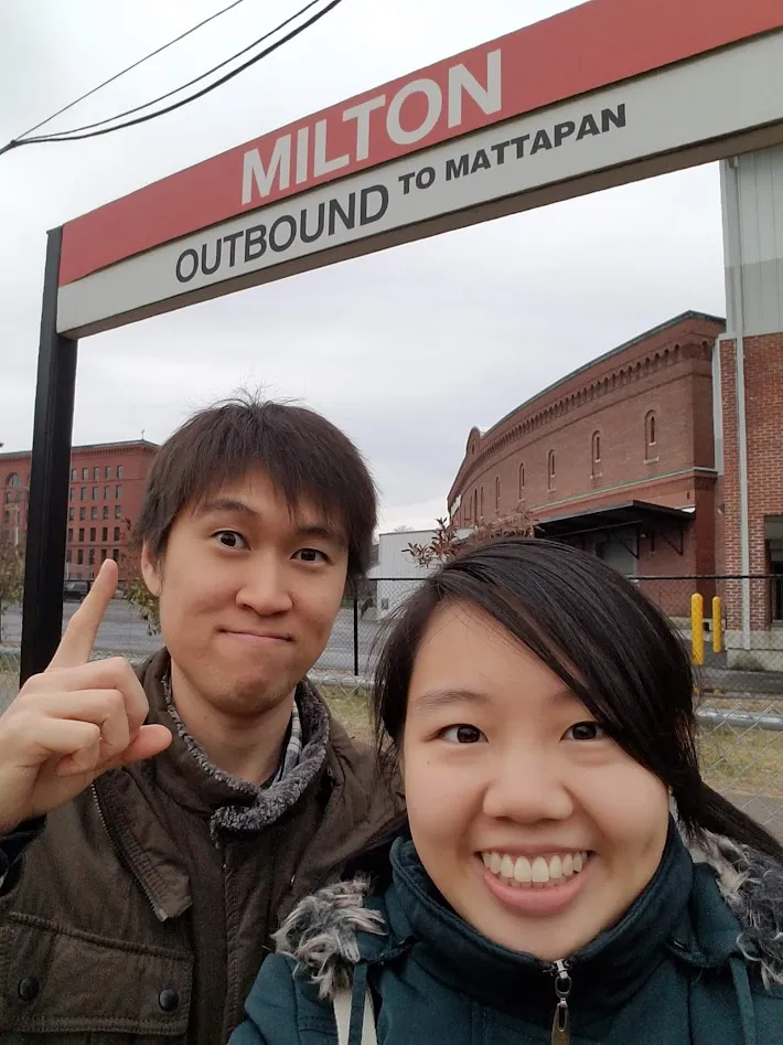 Smiling at Milton Station during an MBTA date adventure