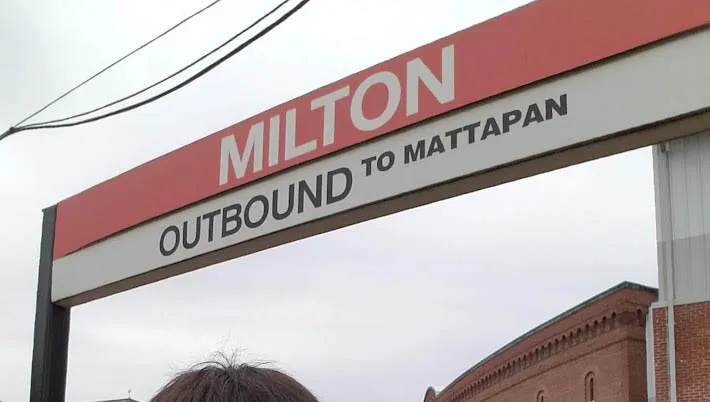 Smiling at Milton Station during an MBTA date adventure